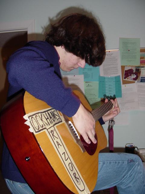 tomplayingguitar.jpg